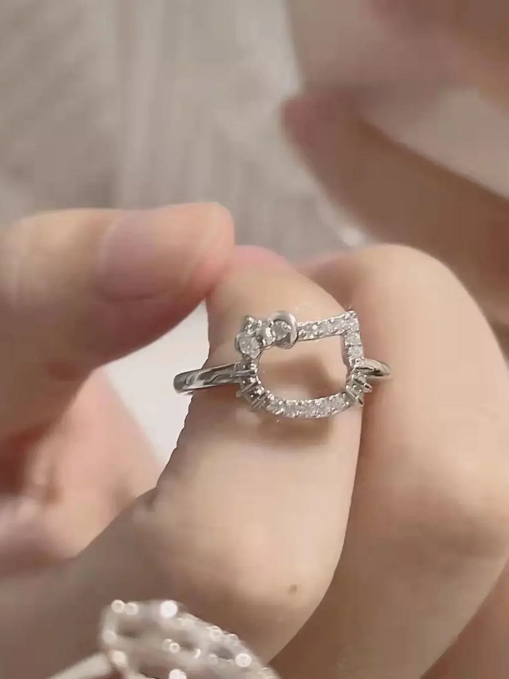 Hello Kitty cat face silver ring product photo