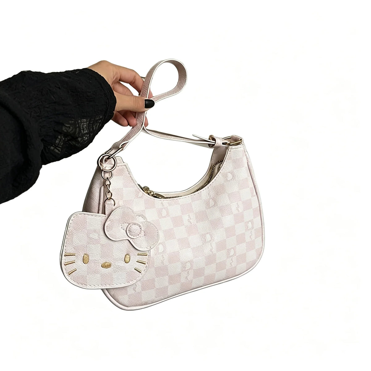 Cute Hello Kitty handbag with checkerboard pattern and cartoon pendant